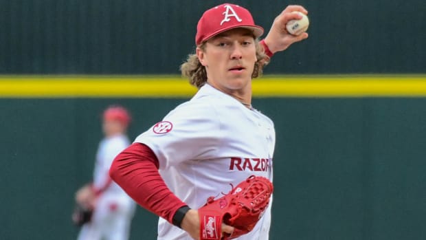 Razorbacks pitcher Hagen Smith throws a pitch against James Madison